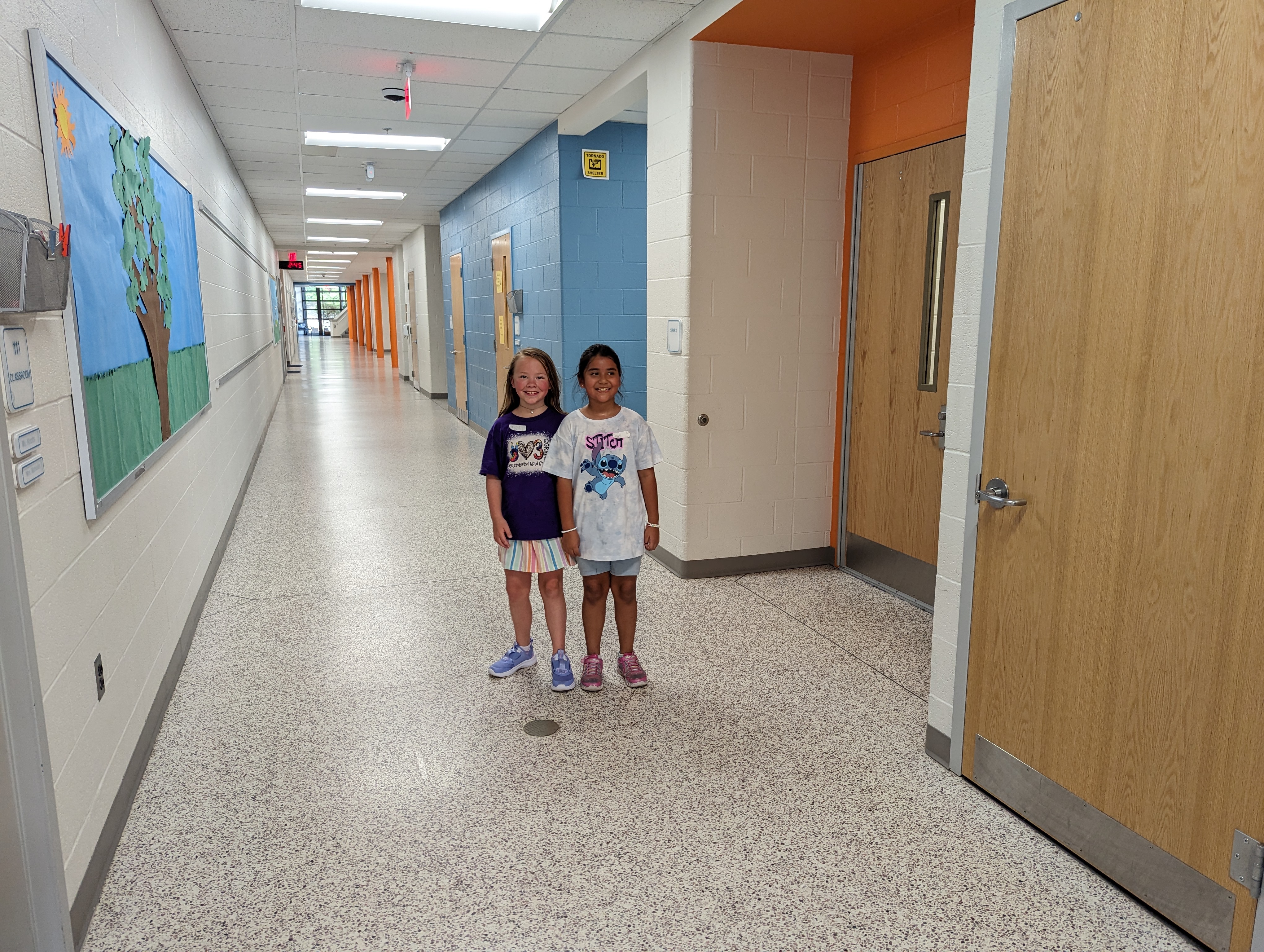 students in the hallway.